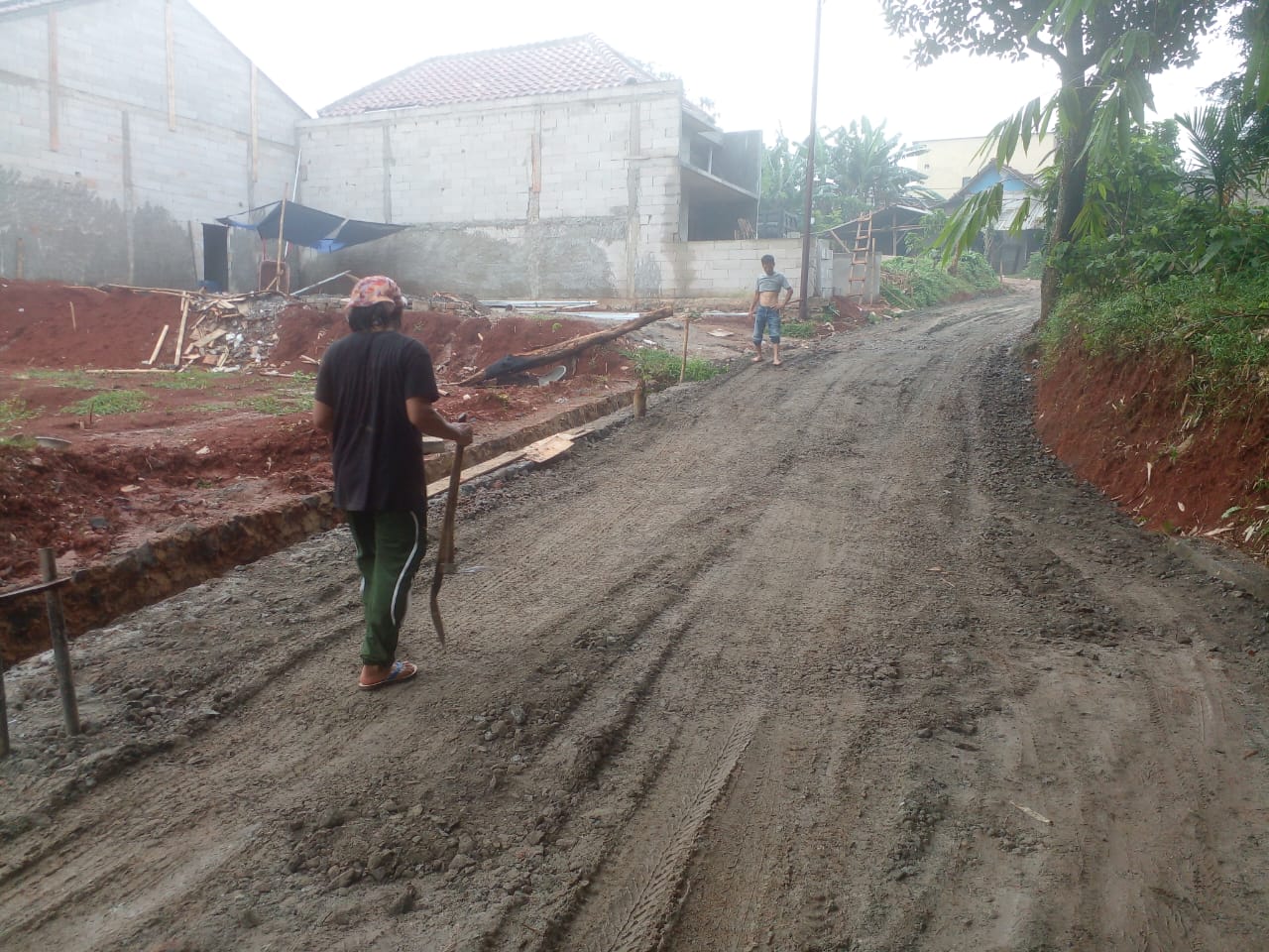 Pengerasan dan pengaspalan jalan